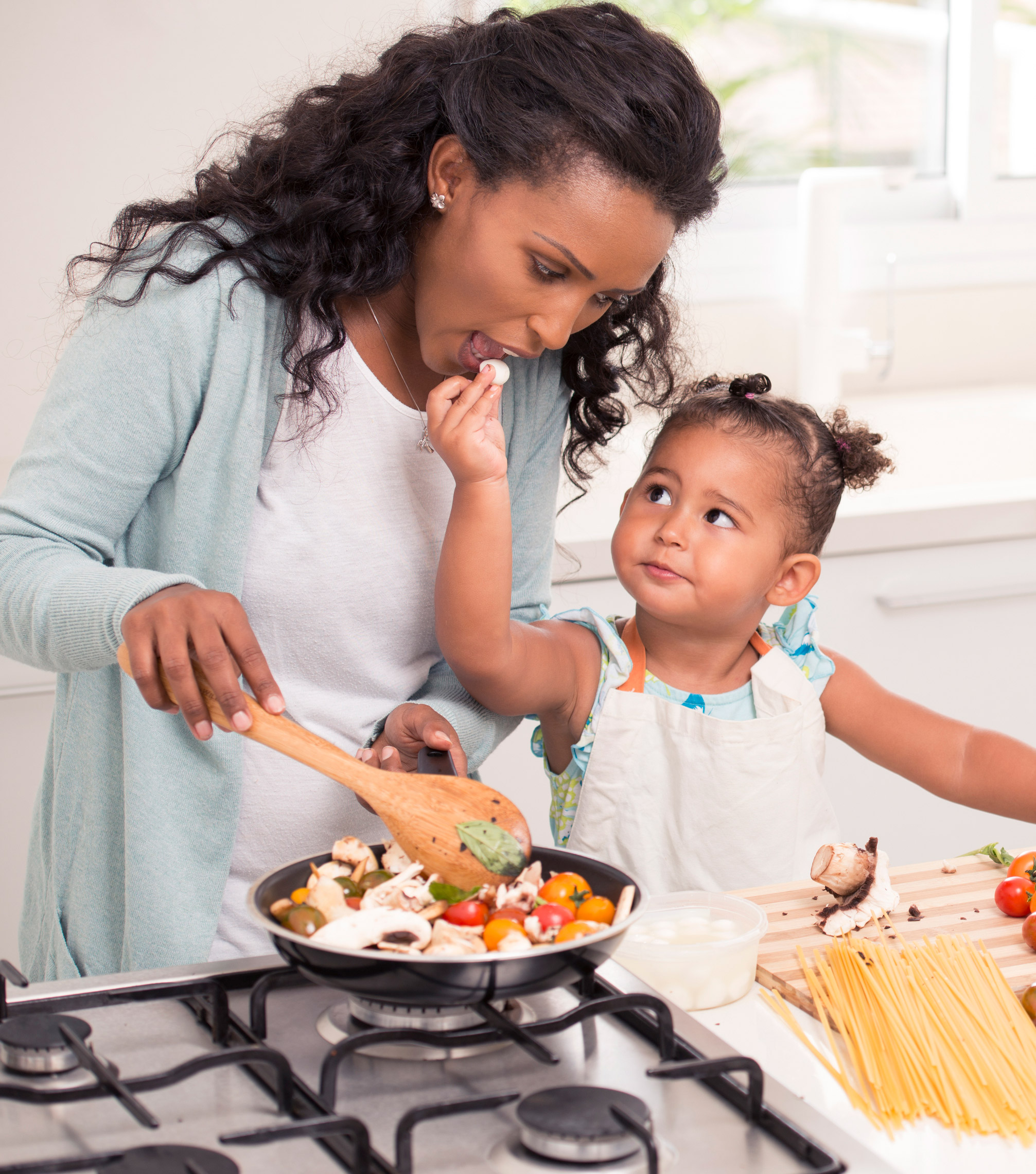 Mom and daughter eating